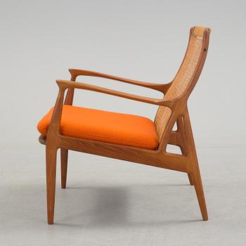 S A ANDERSEN, ERIK ANDERSEN & PALLE PEDERSEN, a teak and rattan easy chair from Horsnaes, Horsens, Denmark, 1960's.