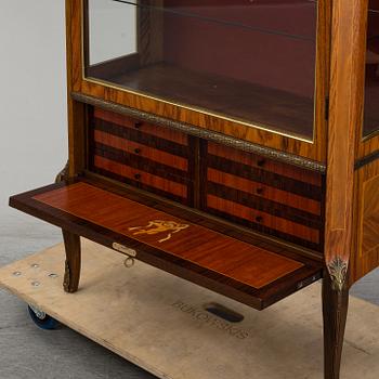 A Louis-XVI style display cabinet, third quarter of 20th century.