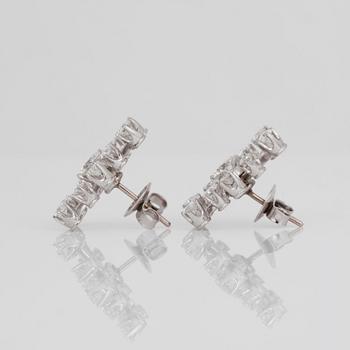 A pair of brilliant-cut diamond earrings. Total carat weight circa 2.90 cts.