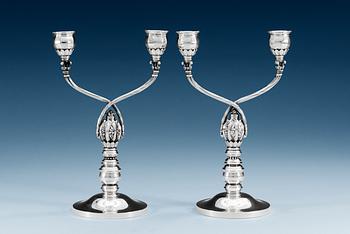 1085. A pair of Georg Jensen candelabra, Copenhagen 1921, 830/1000 silver, Swedish import marks, design nr 343.