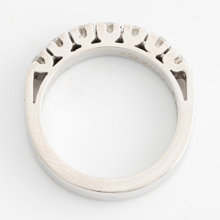 Half-eternity ring with brilliant-cut diamonds.