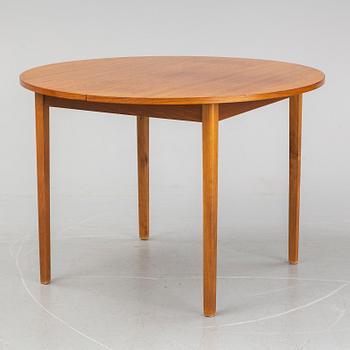 A teak veneered table, second half of the 20th century.