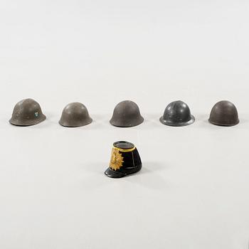 Five military helmets and a hat, late 19th and 20th century.