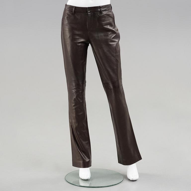 Apair of dark brown leather pants by ralph lauren.