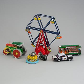 A lot of eight tinplate toys late 20th century.