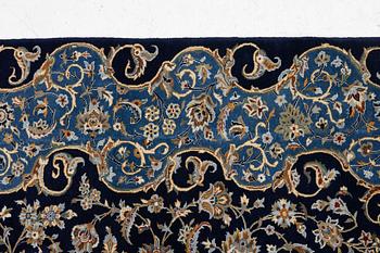 A Royal Keshan carpet, signed, c. 395 x 295 cm.