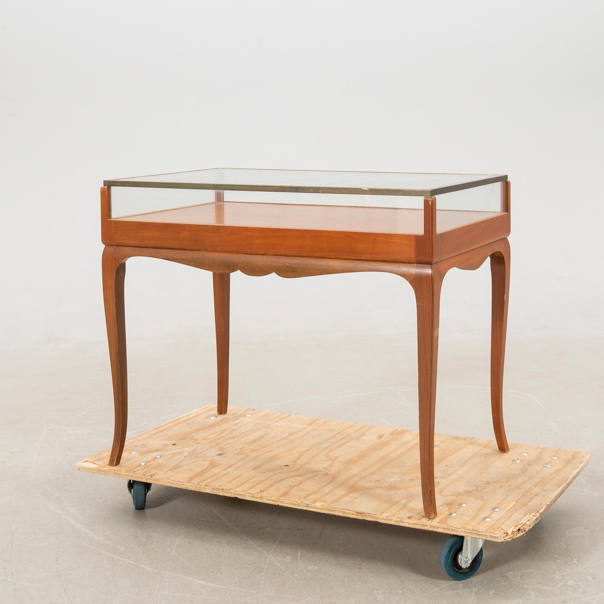 Display table Rococo style, first half of the 20th century.