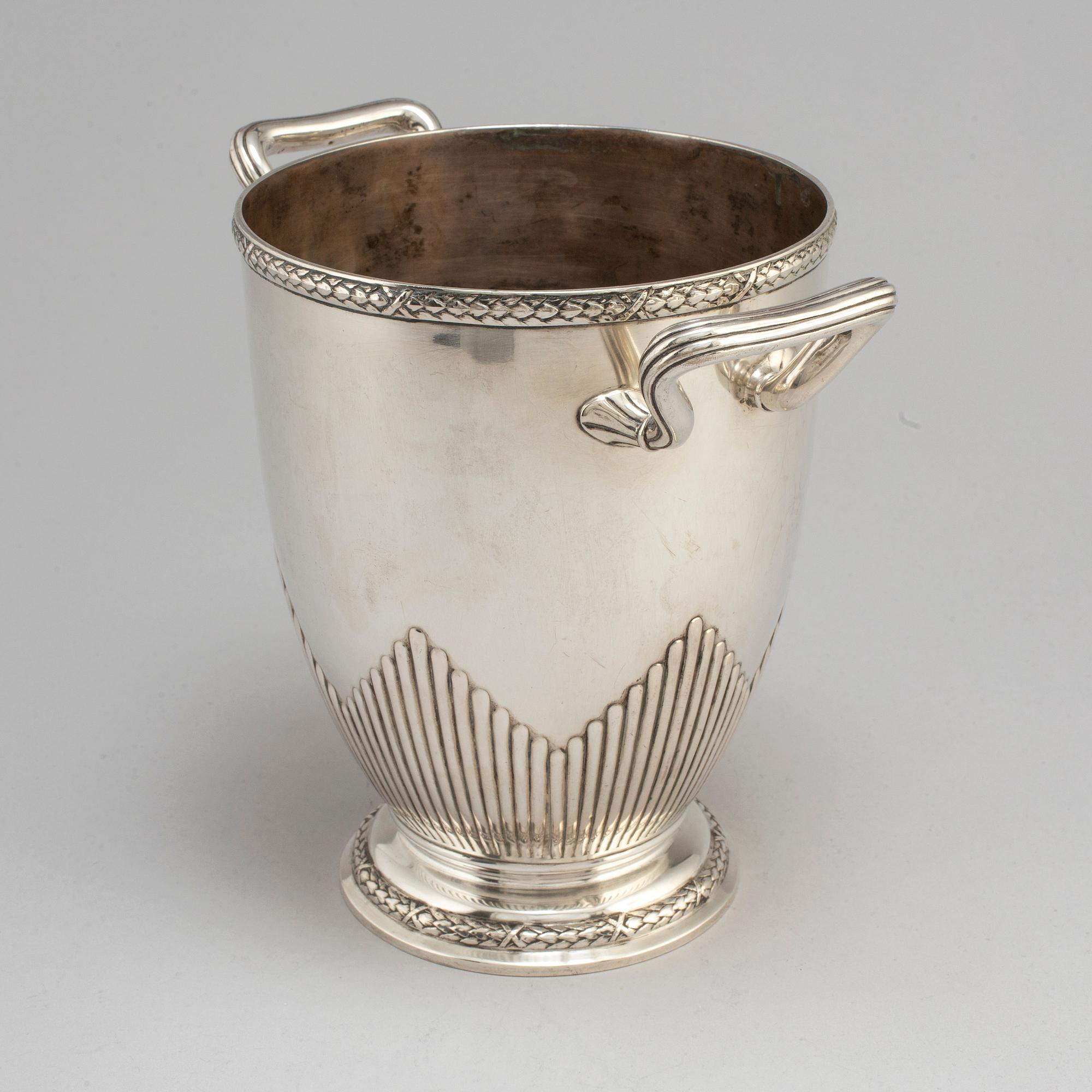 A German silver champagne cooler marked Miller Ulm, eraly 20th Century.