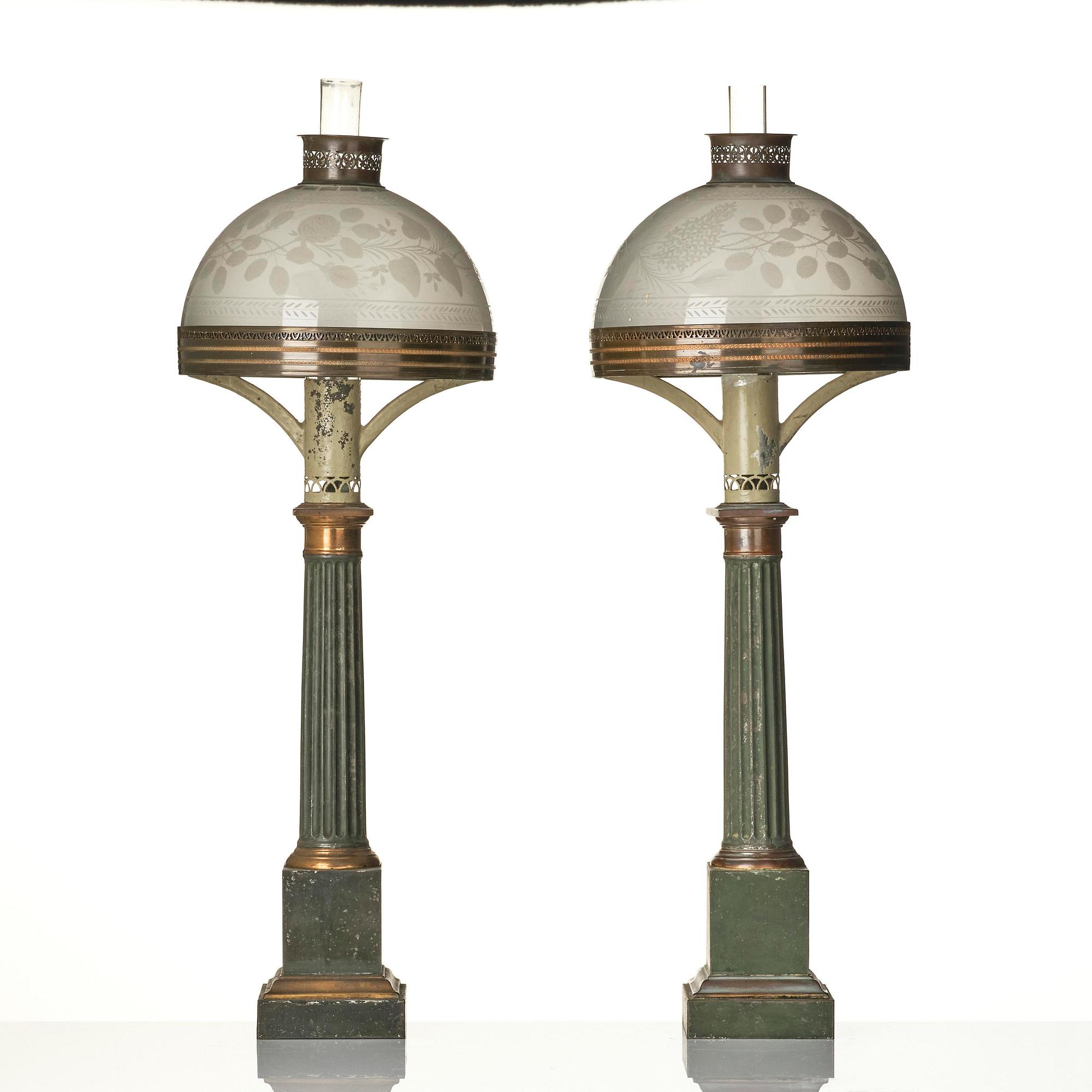 A pair of Empire painted sheet metal carcel oil lamps.