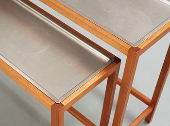 A Josef Frank set of mahogany and stainless steel tables, Svenskt Tenn, model 548.