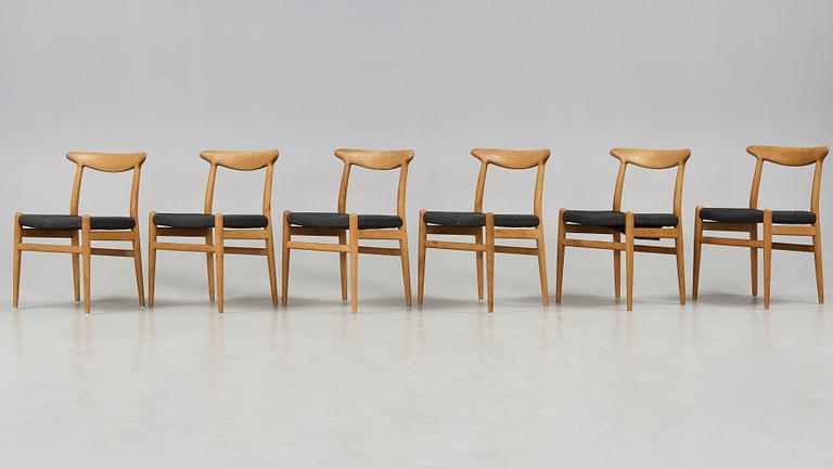 Hans J. Wegner, a set of six oak dining chairs, C. M. Madsen, Denmark 1950's-60's.