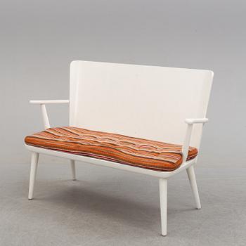 A second half of the 20th century sofa, pair of armchairs and coffee table by Göran Malmvall.
