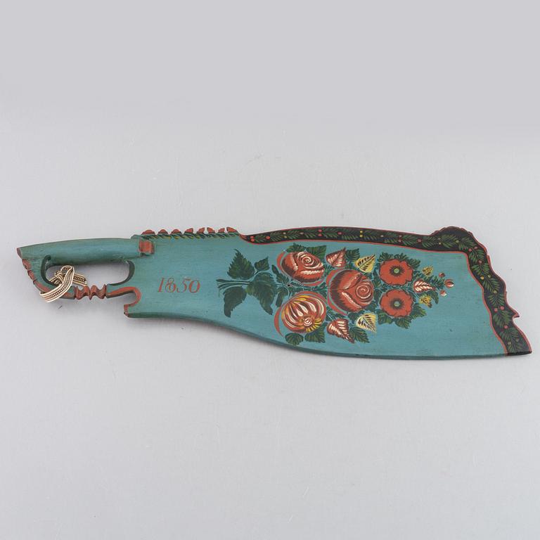 A carved and polychrome painted folk art wedding gift by P. Schenler, Hälsingland, Sweden, dated 1843.