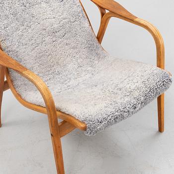 Yngve Ekström, fåtölj med fotpall, "Lamino", Swedese.