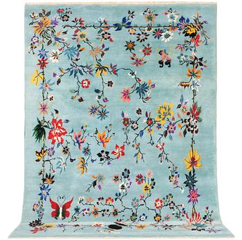 An oriental carpet, a. 370 x 261 cm.