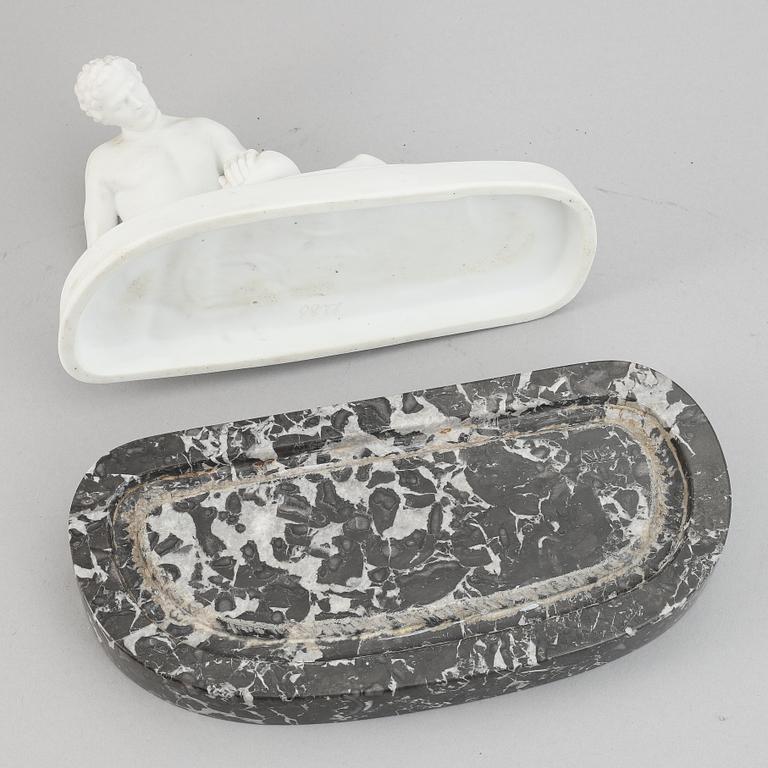 A parian figurine, 'the dying gaul', after an antique sculpture. 20th century.