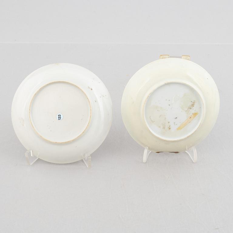 Two Chinese grisaille porcelain saucers, Qing dynasty, Qianlong (1736-95).