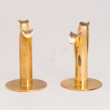 Six brass candle sticks "Liljan" by Ivar Ålenius-Björk for Ystad metall, second half of the 20th century.