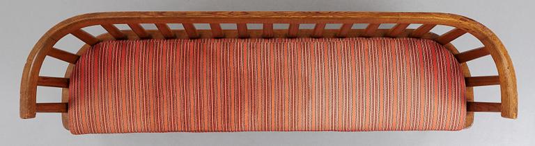 Axel Einar Hjorth, a stained pine version of "Utö" sofa, Nordiska Kompaniet, Sweden 1930's.