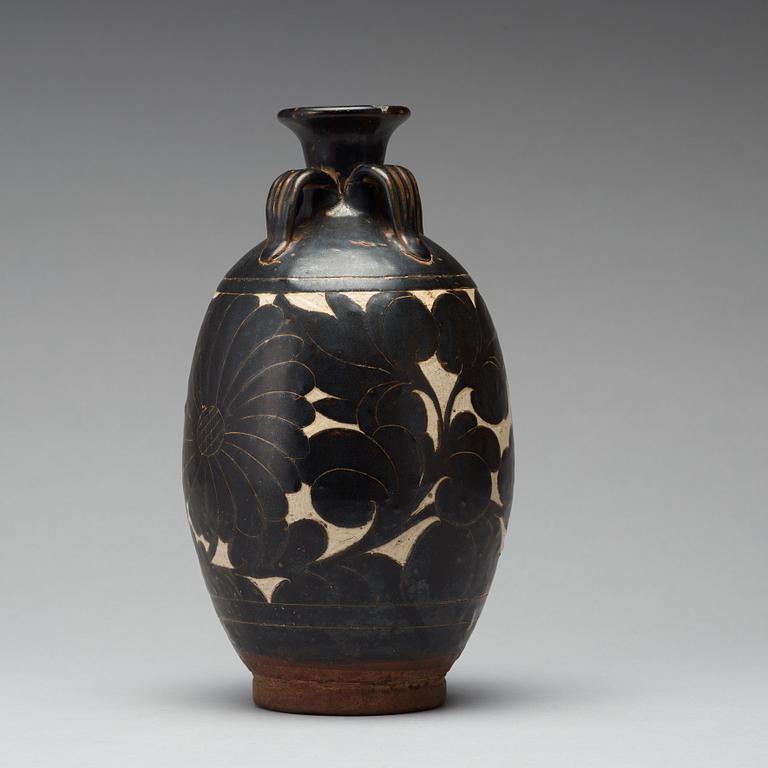 A black-glazed sgraffito vase, presumably Yuan Dynasty.