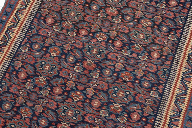 An antique Senneh kilim, West Persia, c. 149 x 11 cm.