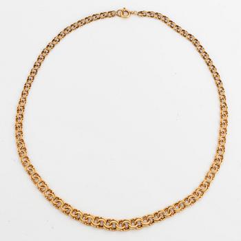 18K gold necklace.