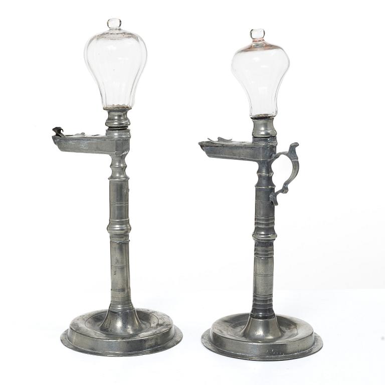 Oillamps, two similar, 19th century.