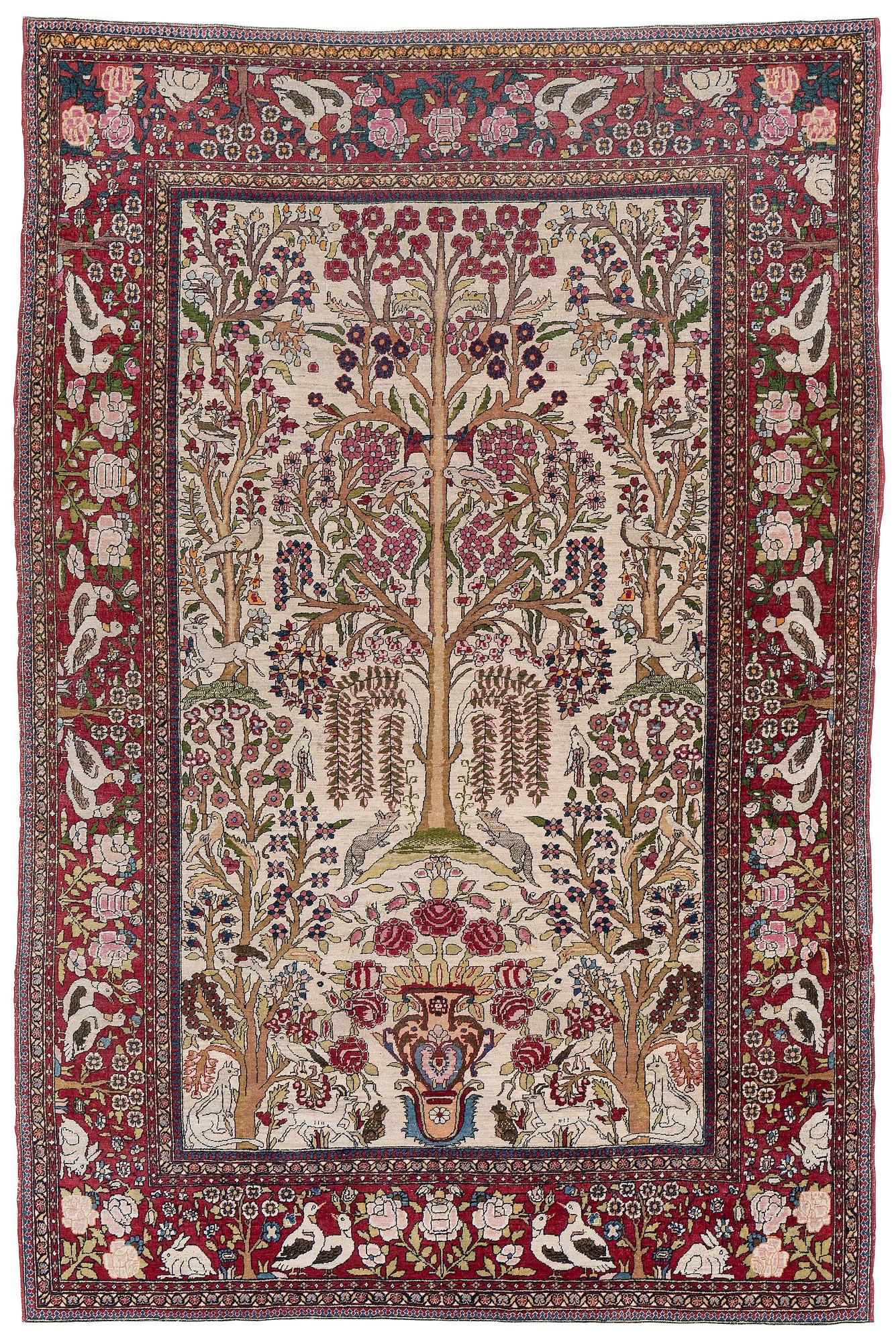 An antique pictoral Esfahan rug, Central Persia (Iran), c 213 x 142 cm.