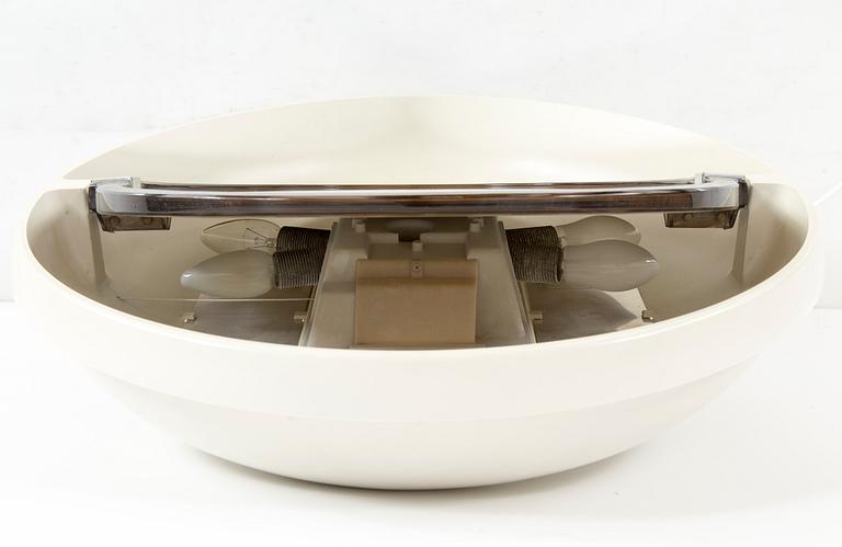 A "SPACE AGE" WALL MIRROR WITH LIGHT BY ALLIBERT, 1970s.