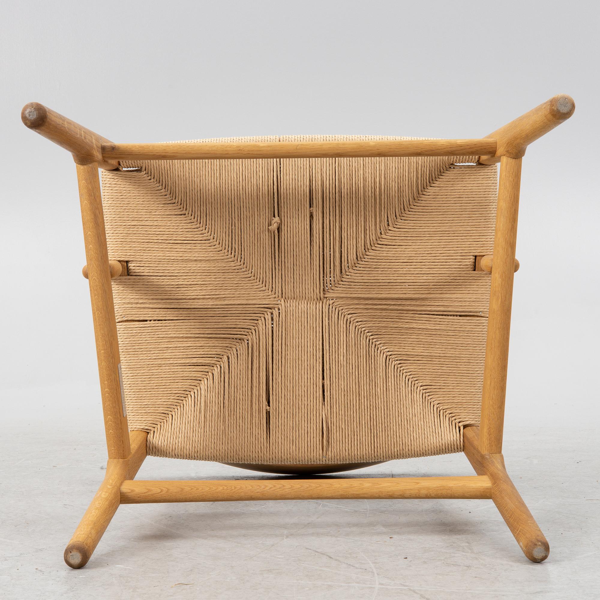 Hans J. Wegner, a CH26 chair, Carl Hansen & Son, Denmark, 21st century.