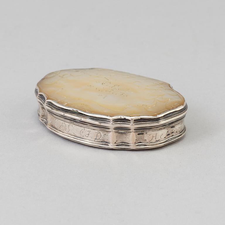 An 18th century silver and mother-of-pearl rococo snuff box.