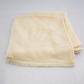 Cartier, a wool/silk scarf.