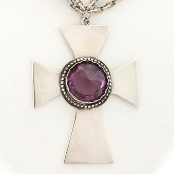 Necklace of silver in the form of a cross with faceted glass.
