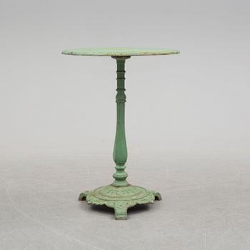 A circa 1900 iron table.