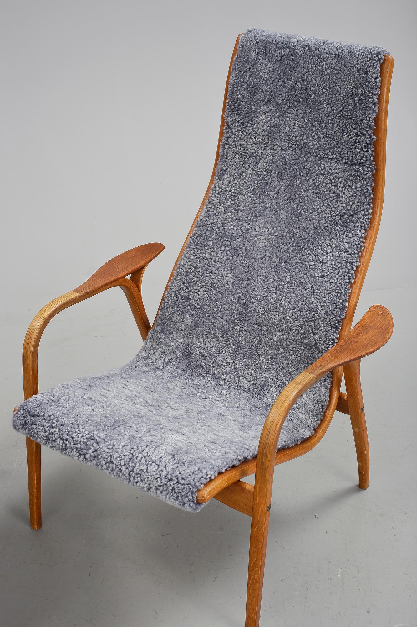 FÅTÖLJ MED FOTPALL. "Lamino", Yngve Ekström.