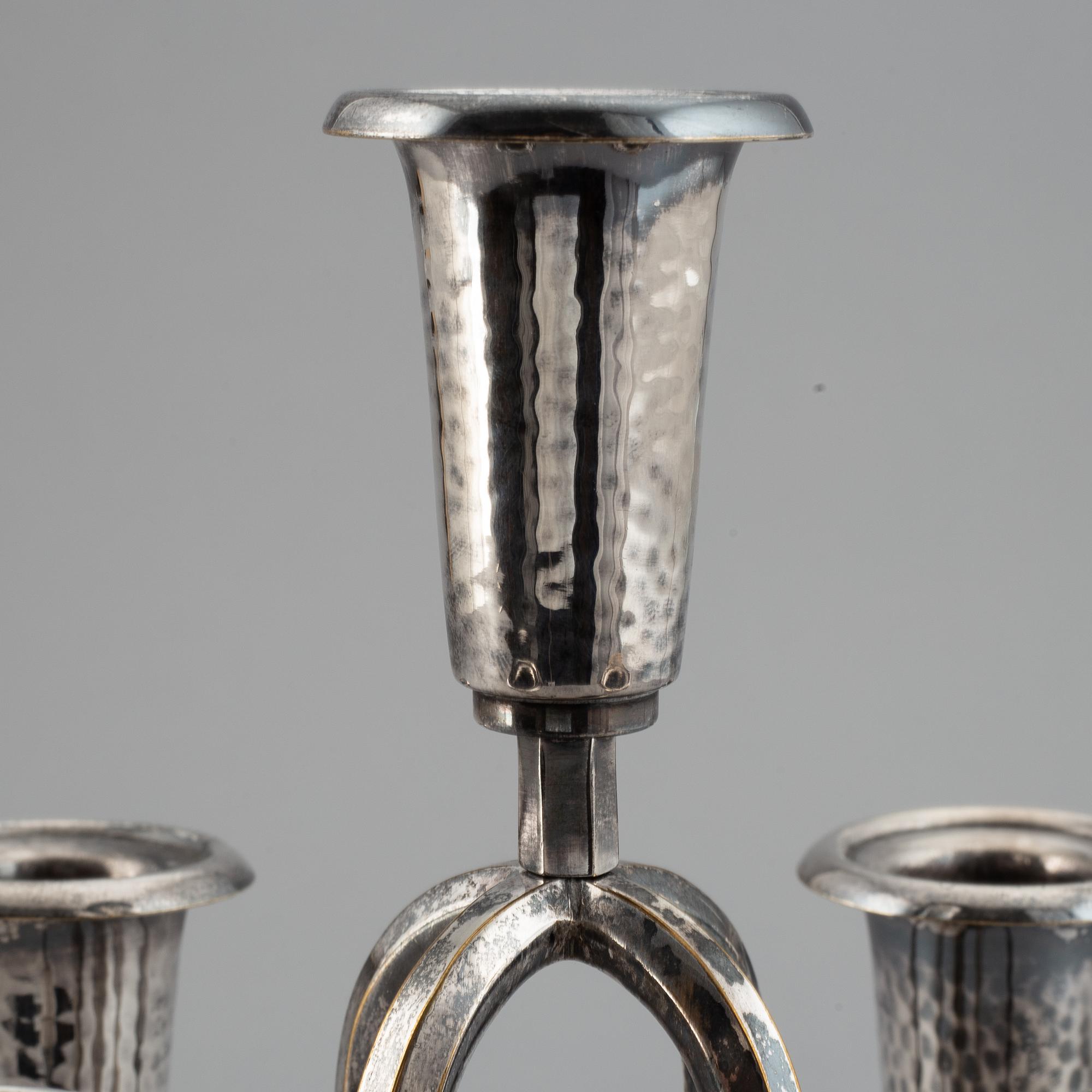 A silver plated candelabrum, early 20th Century.