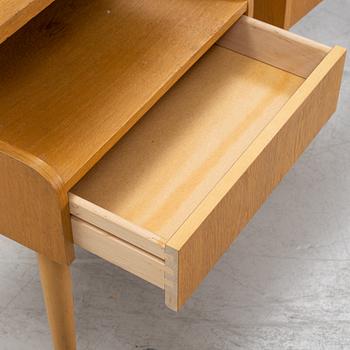A pair of oak veneered bedside tables, mid 20th Century.