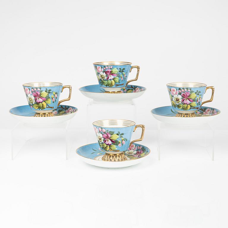 Kuznetsov, four porcelain cups and saucers, Russia, circa 1900.