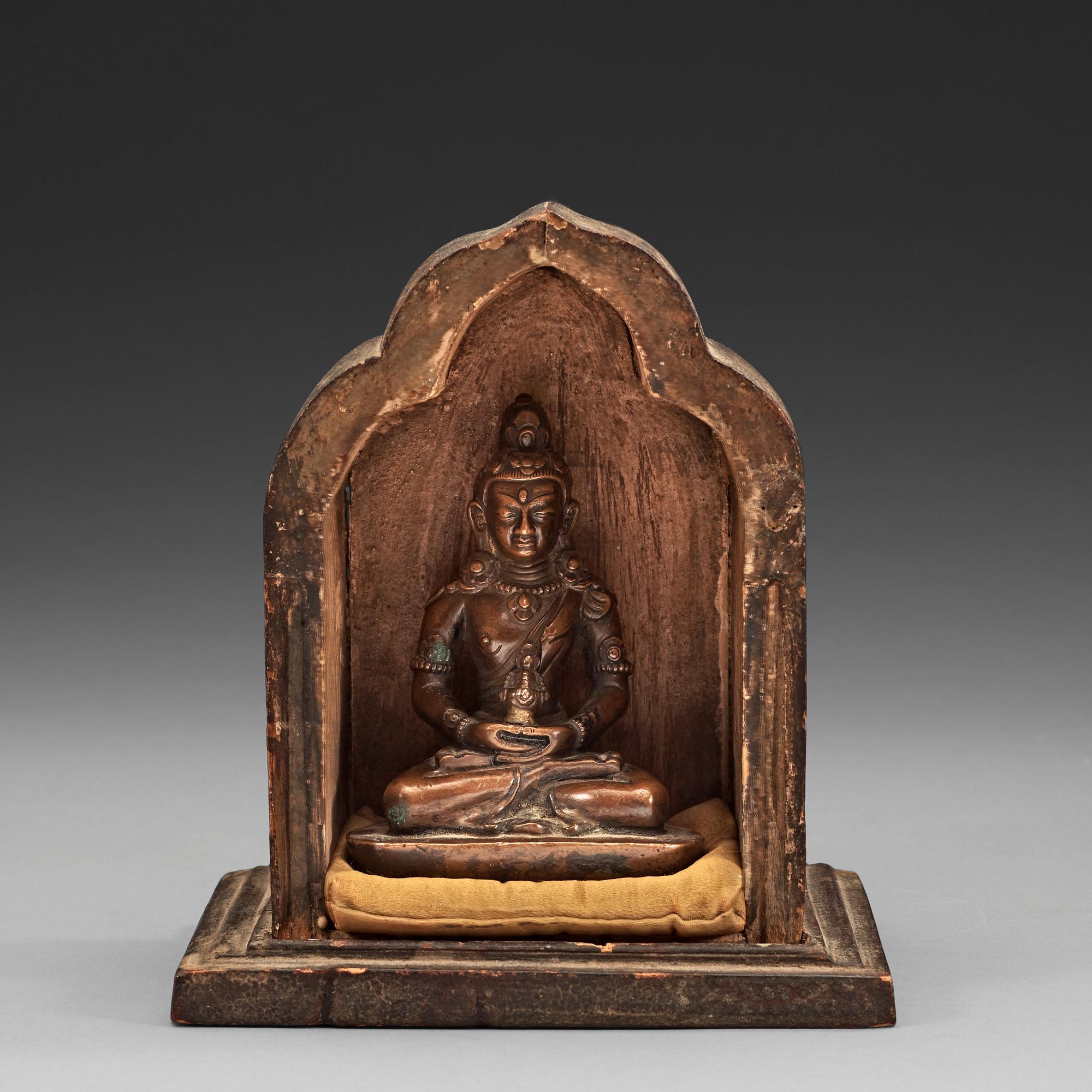 A copper alloy figure of Amitayus, Tibet/Nepal, presumably late 19th century/early 20th century.