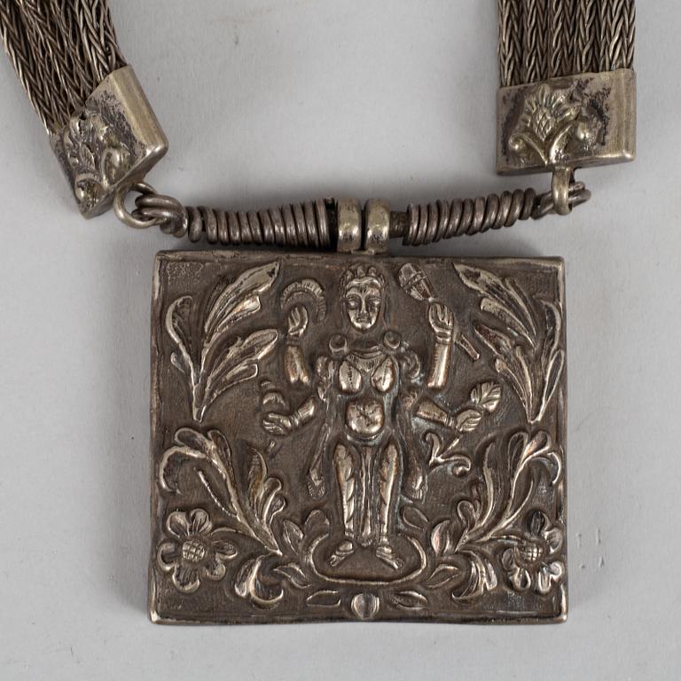 A Tibethan pendant/necklace, circa 1900.
