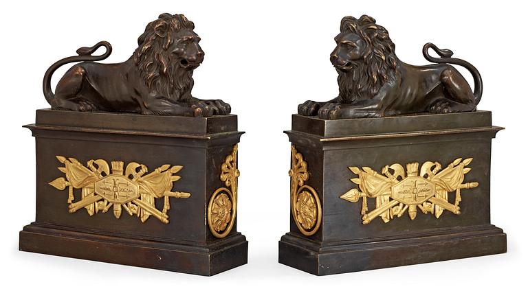 A pair of French Empire early 19th century gilt and patinated bronze chenets.