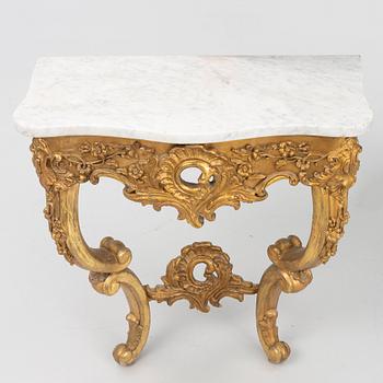 A Rococo style console table, late 19th Century.