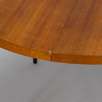 A mid-20th century dining table.