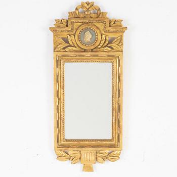 A Gustavian style mirror by John Lundmark, 20th Century.