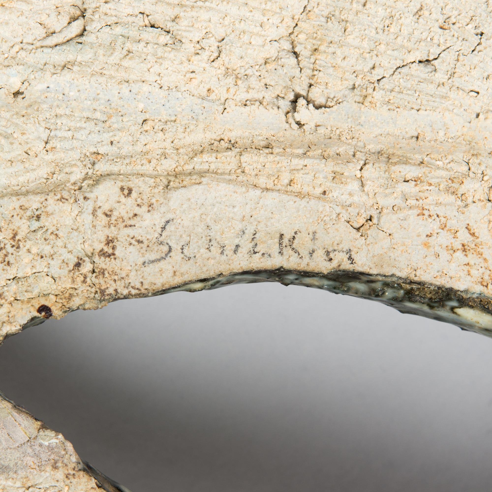 Michael Schilkin, a stoneware sculpture, signed Schilkin.