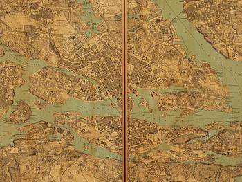A G.A. Berg cabinet with printed map depicting the city of Stockholm, Sweden 1940's.
