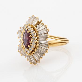 Ring in 18K gold with a marquise-cut red stone and baguette-cut diamonds.