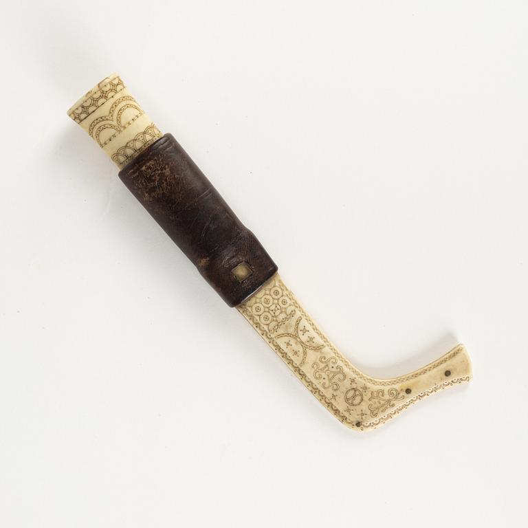 A reindeer horn knife dated 1916.