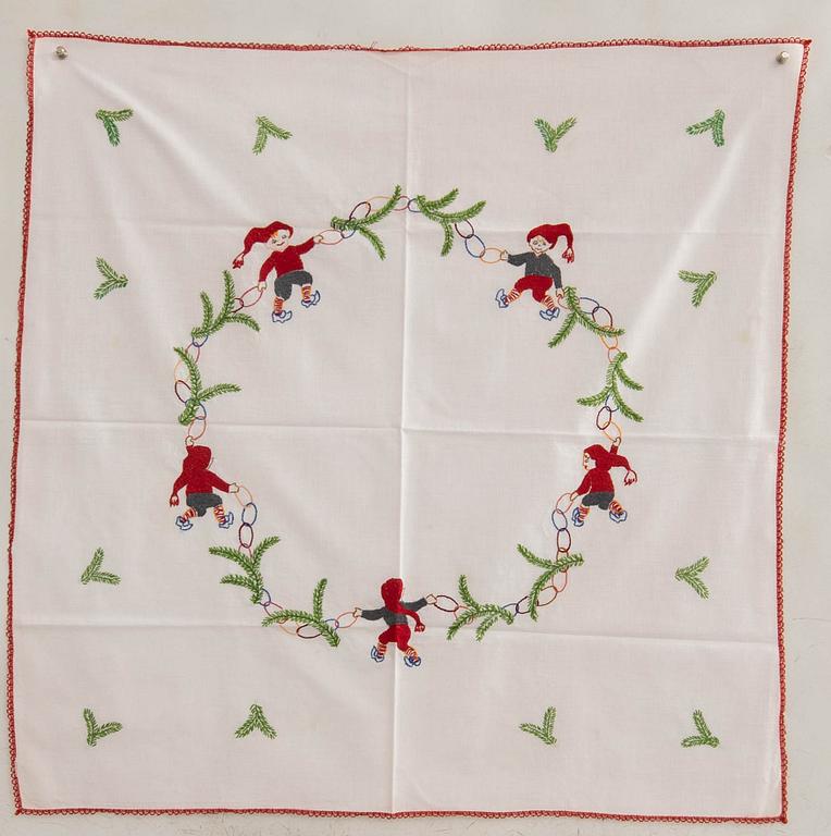 A collection of Christmas tablecloths 12 pcs first half/mid 20th century.