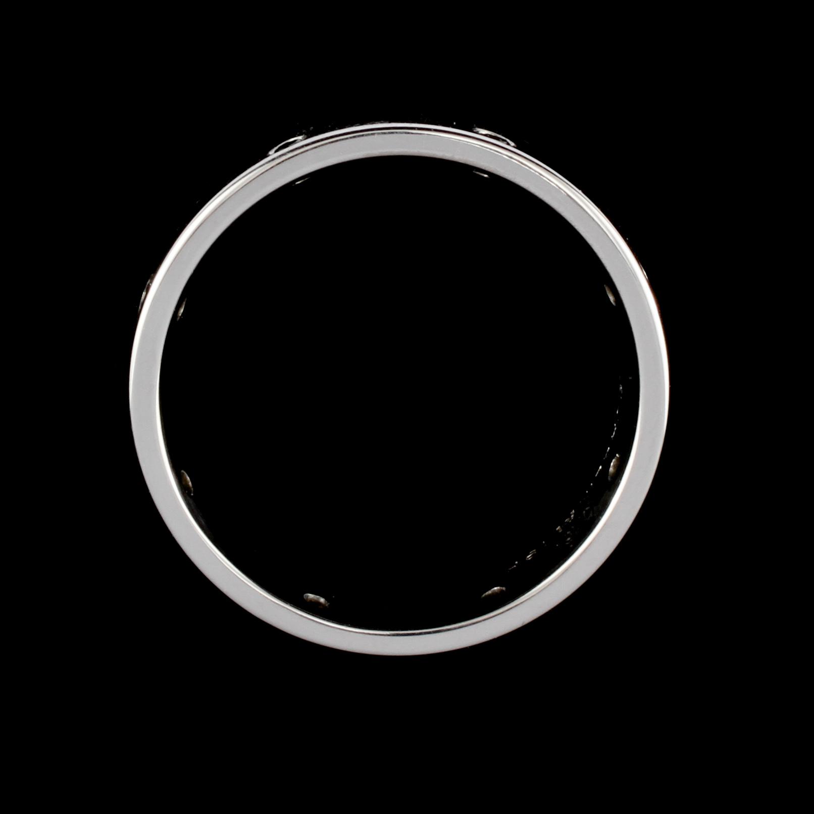RING, 18k vitguld med 8 svarta briljantslipade diamanter, totalt 0.16 ct, Scahlins No1, Scahlins, Stockholm. Vikt 12 g.